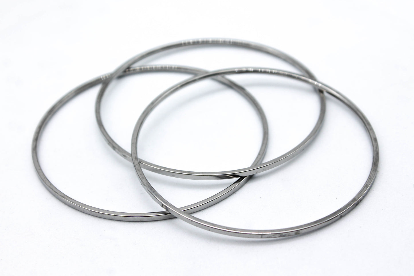 TRIPLE PULSERA / AROS FIN DE SEMANA 7CMS DIAMETRO; TONO PLATEADO