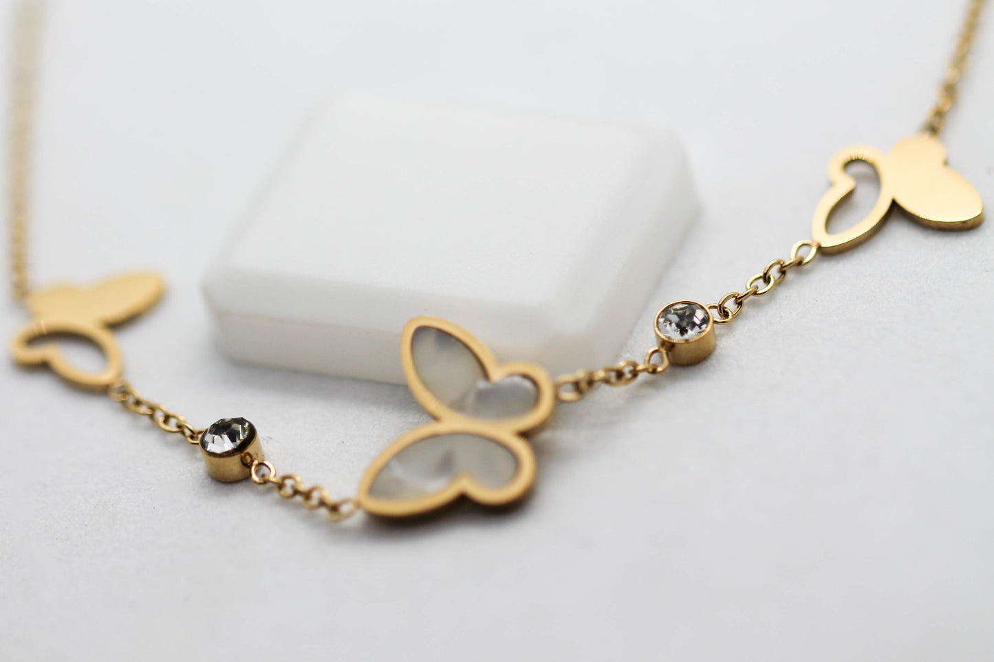 PULSERA 3 MARIPOSAS 2 CIRCONIAS 17CM + EXTENSION 4CM