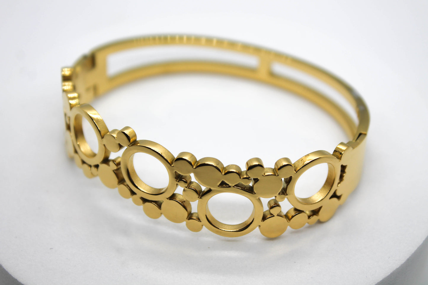 BRAZALETE CIRCULOS; TONO DORADO
