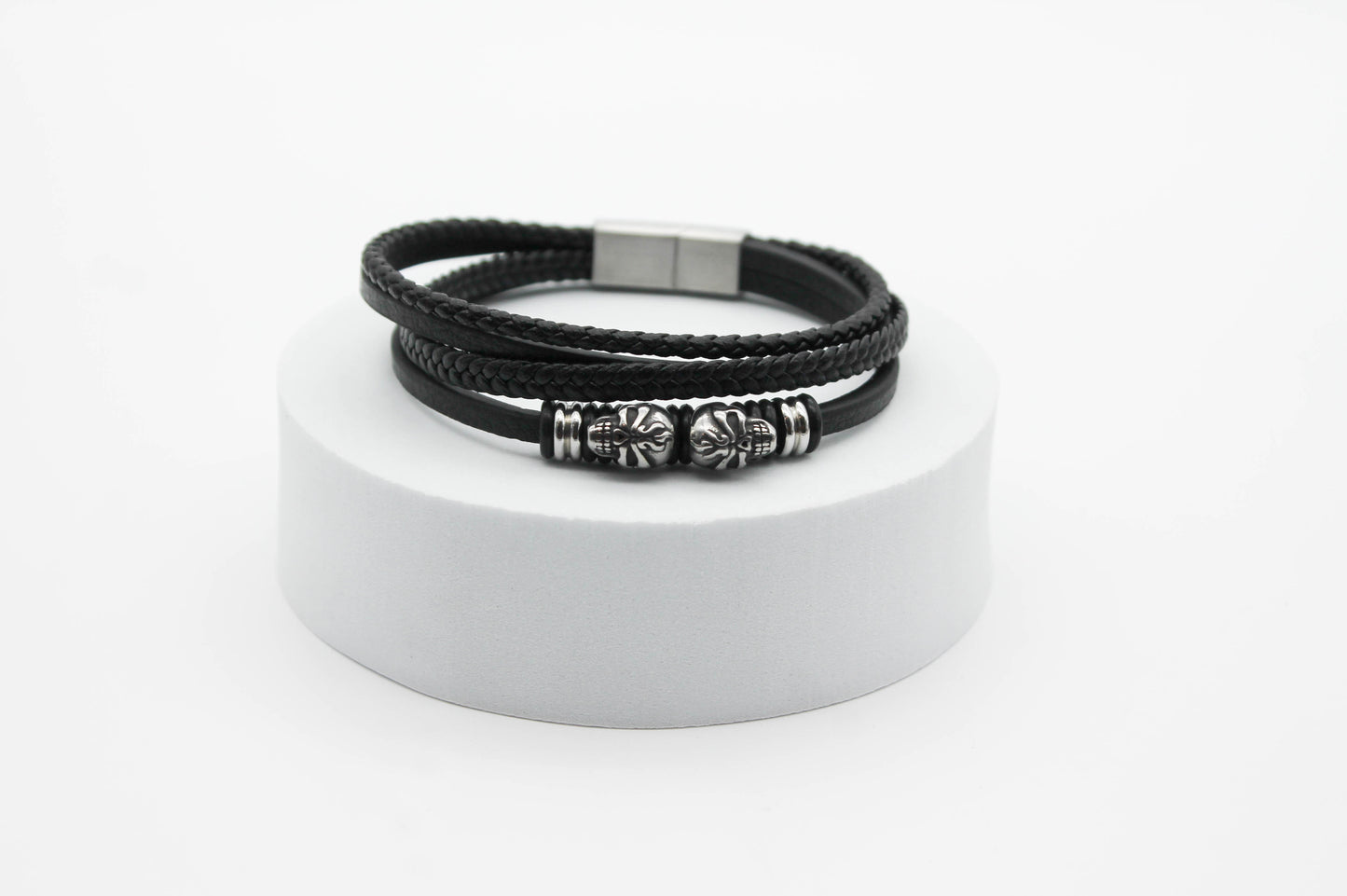 PULSERA CABALLERO NEGRA 4-1 TRENZA TUBULAR Y PLANA CON CALAVERAS 20.5CM