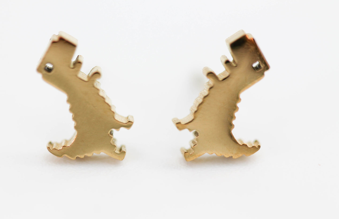 BROQUEL DINOSAURIO GOOGLE, TONO DORADO