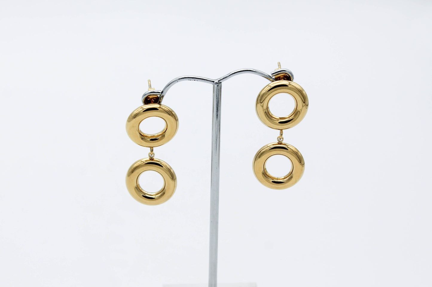ARETE DOBLE CIRCULO HUECO, TONO DORADO