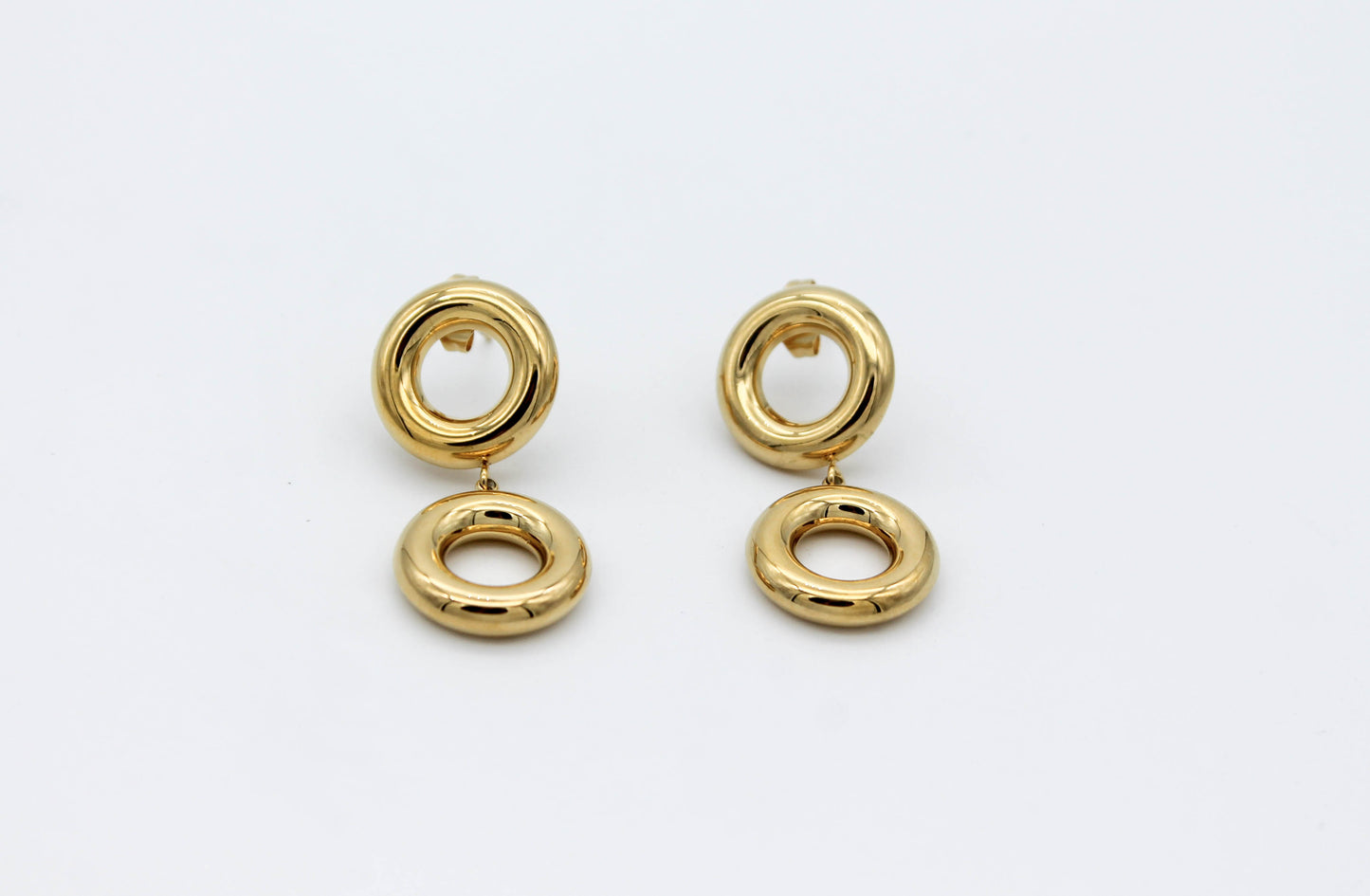 ARETE DOBLE CIRCULO HUECO, TONO DORADO