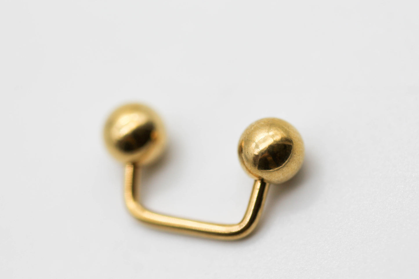 PIERCING TELEFONO TONO DORADO 10MM