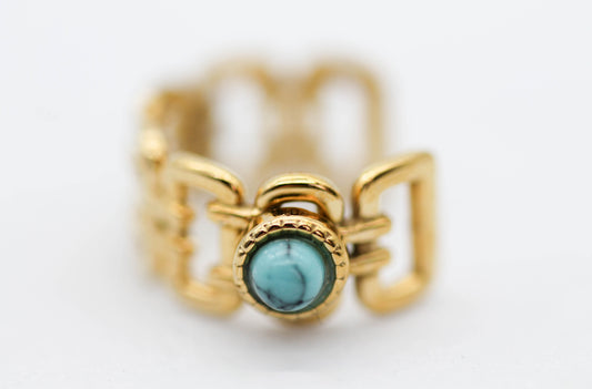 *EAR CUFF/ PIERNCIG FALSO/CONCIENCIA ESLABONES CUADRADOS ABRAZADOS PIEDRA NATURAL AZUL LINEAS NEGRAS 7MM DE ANCHO , TONO DORADO*