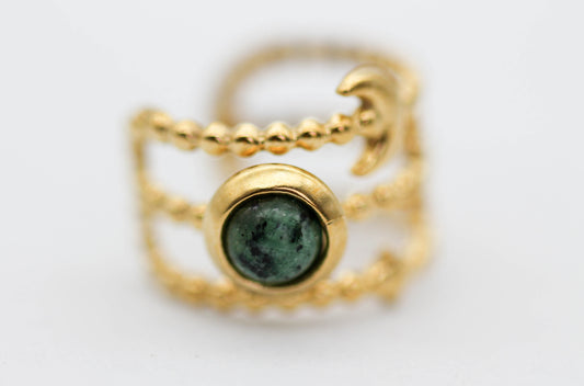 *EAR CUFF/ PIERNCIG FALSO/ CONCIENCIA TRES NIVLES ESTRELLA, LUNA, SOL, PIEDRA VERDE PUNTOS NEGROS 8MM DE ANCHO , TONO DORADO*