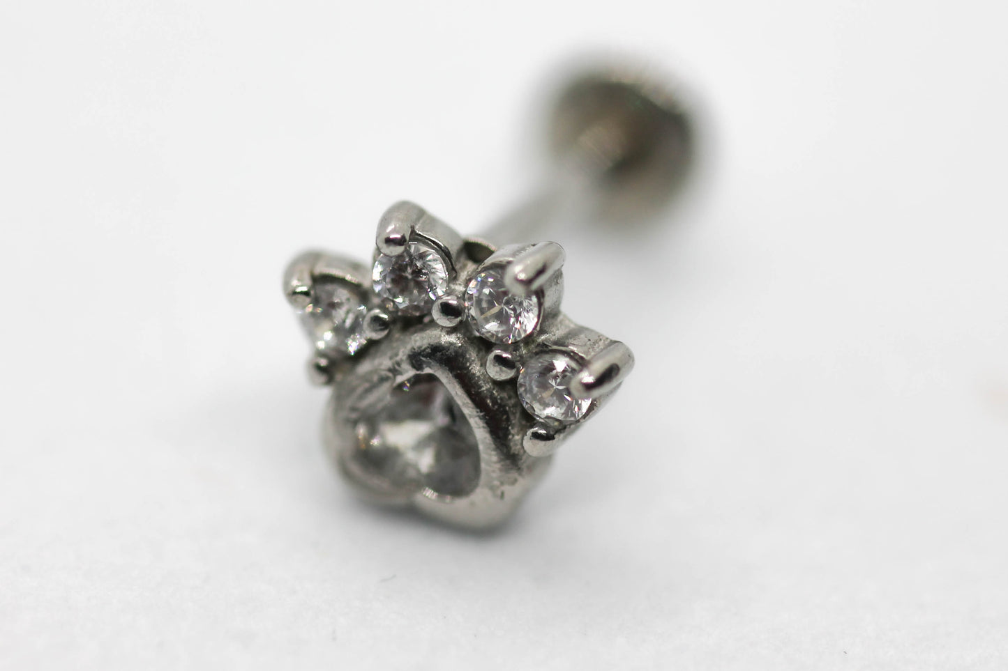 PIERCING HUELLA PERRO/GATO CIRCONIAS; TONO PLATEADO