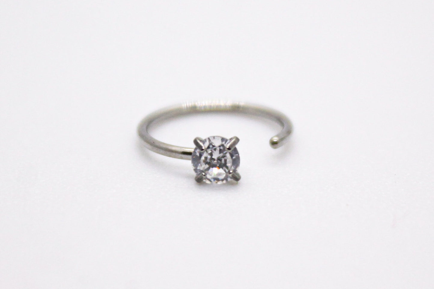 PIERCING ARCO NARIZ CIRCONIA; TONO PLATEADO