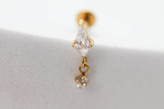 PIERCING ROMBO ALARGADO 7MM, MINI CIRCONIA 2MM COLGANDO; TONO DORADO