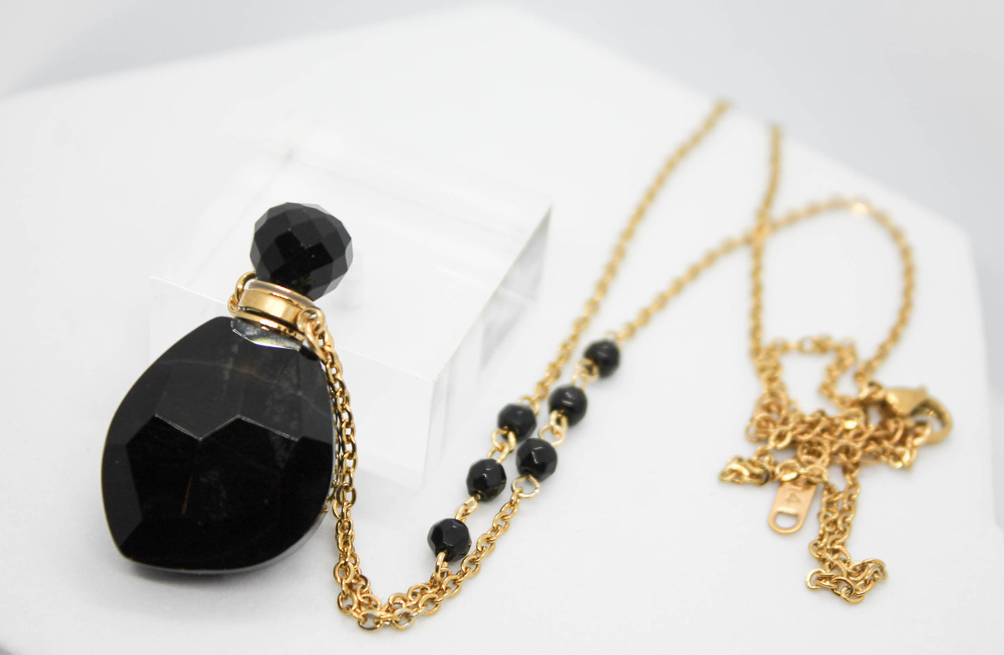 *COLLAR PARA PERFUME PIEDRA NATURAL NEGRA 37X21MM 56CM + EXTENSION 6.5CM*