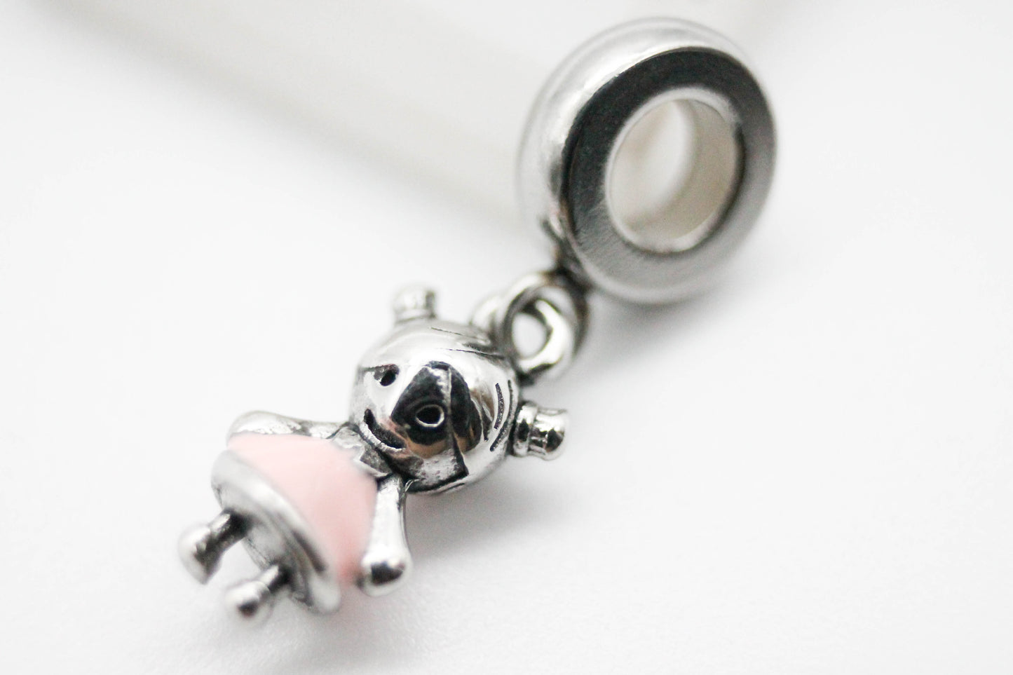 CHARM COLGANTE NIÑA CON COLITAS ESMATEL ROSA