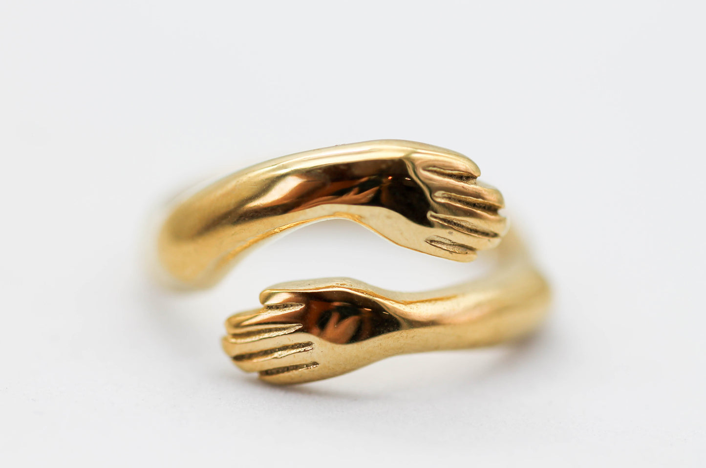 ANILLO ABRAZO AJUSTABLE; TONO DORADO