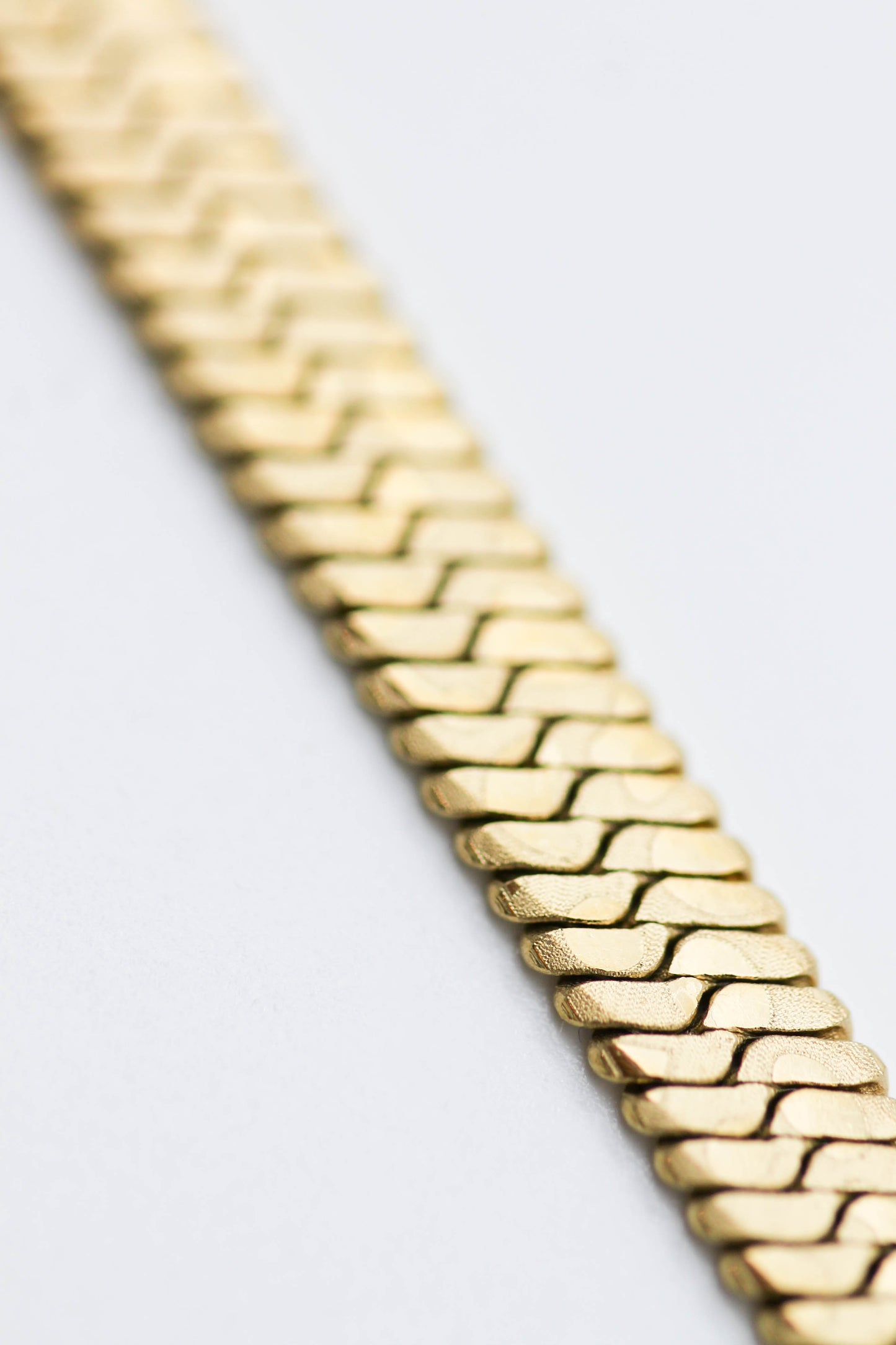 TOBILLERA DOBLE PLANCHADA, 22CM DE LARGO+ EXTENSION 5CM, TONO DORADO