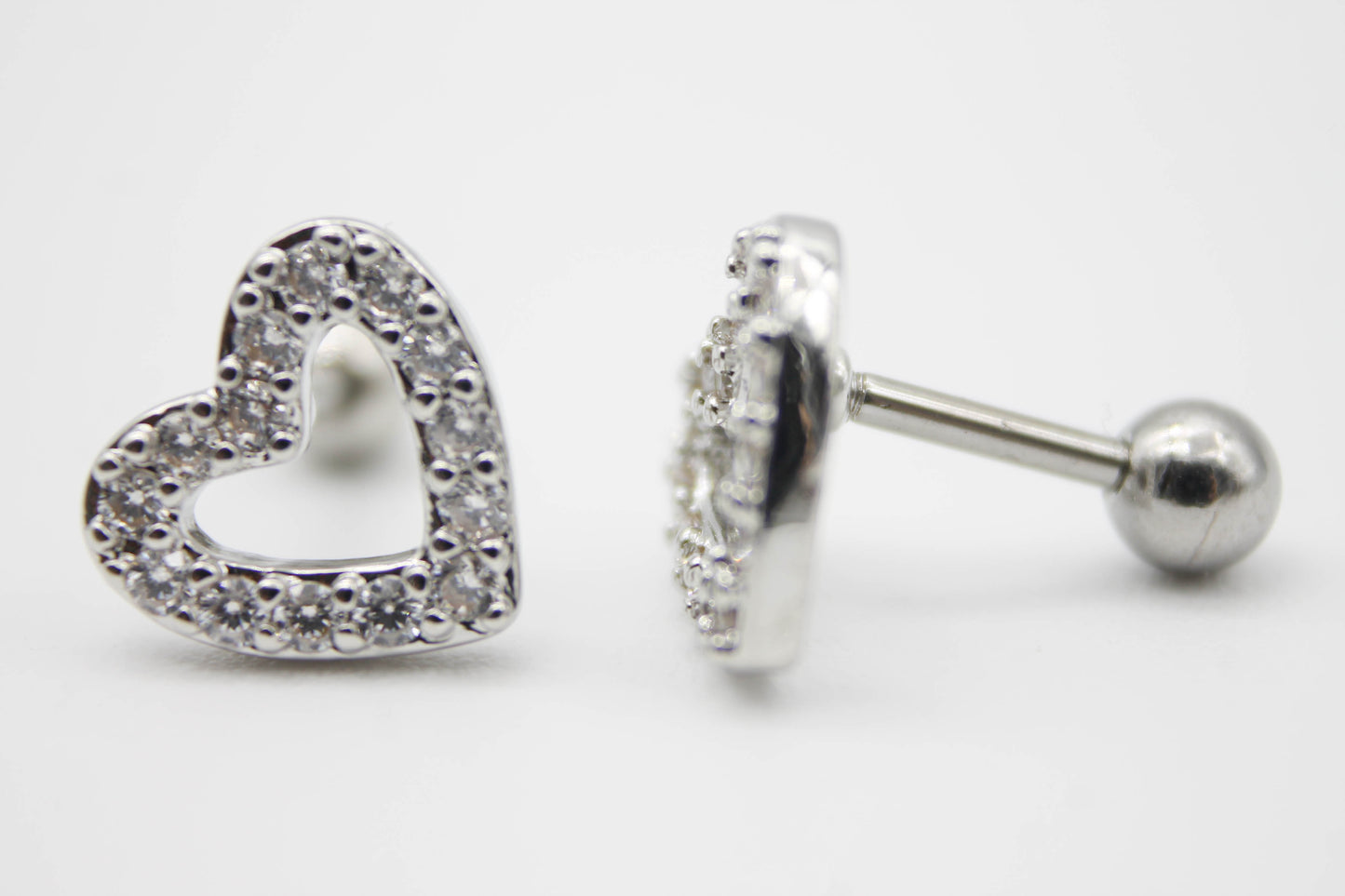 BROQUEL CORAZON HUECO CIRCONIAS 10MM TOPE DE ROSCA; TONO PLATEADO