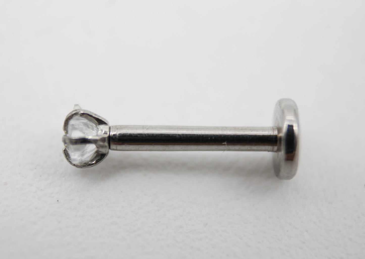 PIERCING MINI ESTRELLA CIRCONIA, TONO PLATEADO