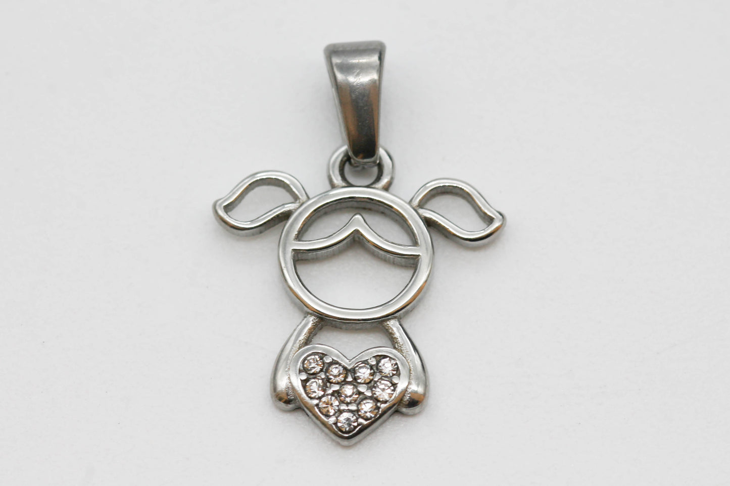 DIJE NIÑA ABRAZO CORAZON DE CIRCONIAS 15 MM, PLATEADO
