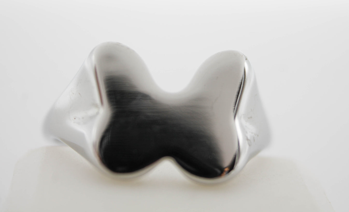 ANILLO MOÑO "DAISY", TONO PLATEADO