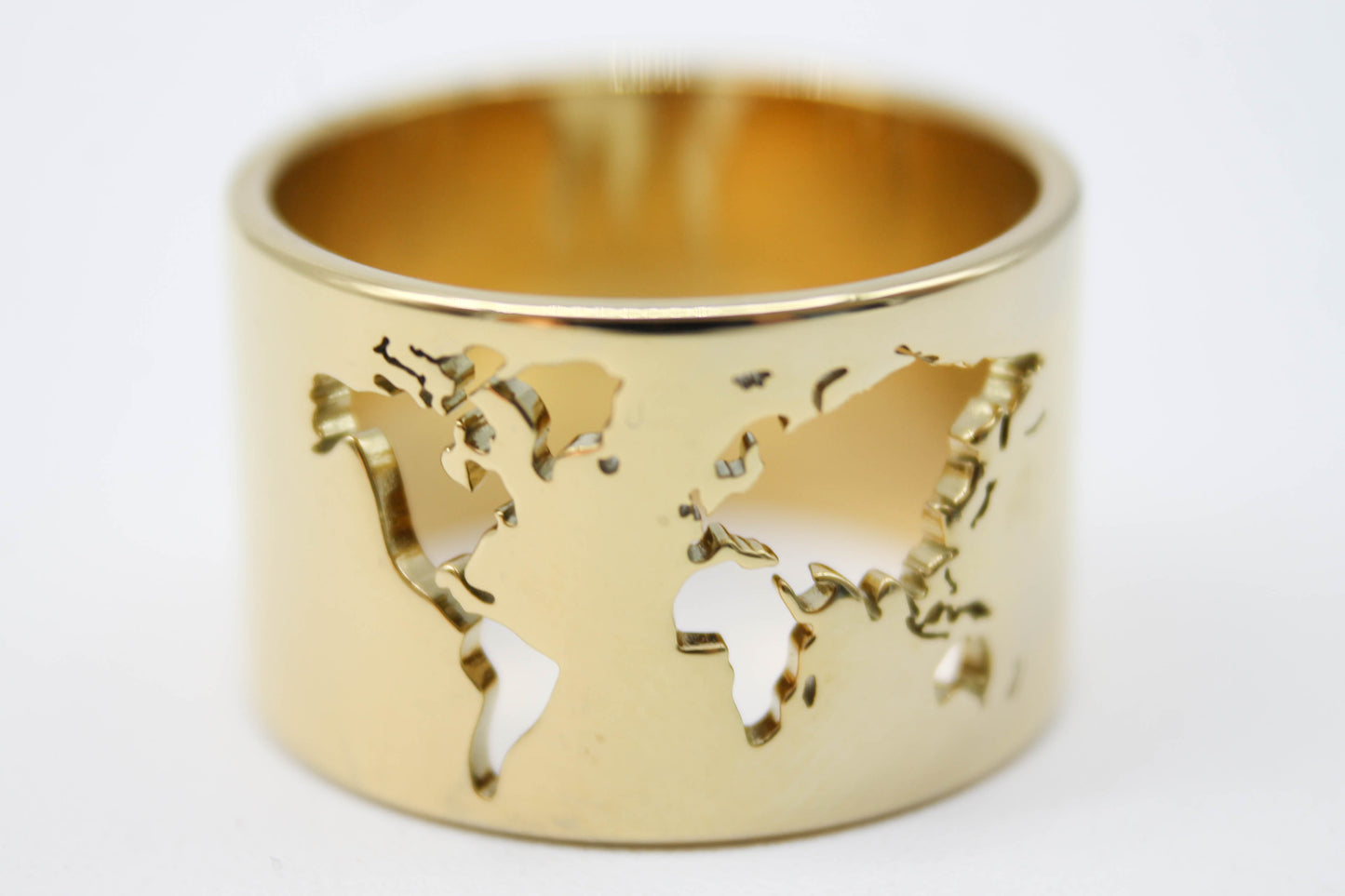 ANILLO MAPAMUNDI ANCHO, TONO DORADO