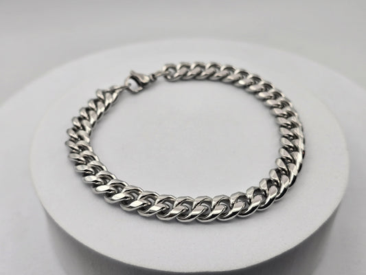 PULSERA CABALLERO BARBADA 8X3MM ANCHO; 21CMS LARGO TONO PLATEADO