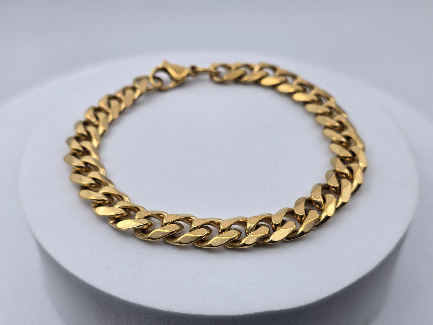 PULSERA CABALLERO BARBADA 9X3MM ANCHO; 21CMS LARGO TONO DORADO