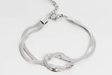 PULSERA PLANCHADA NUDO 16 CM EXT 4CM