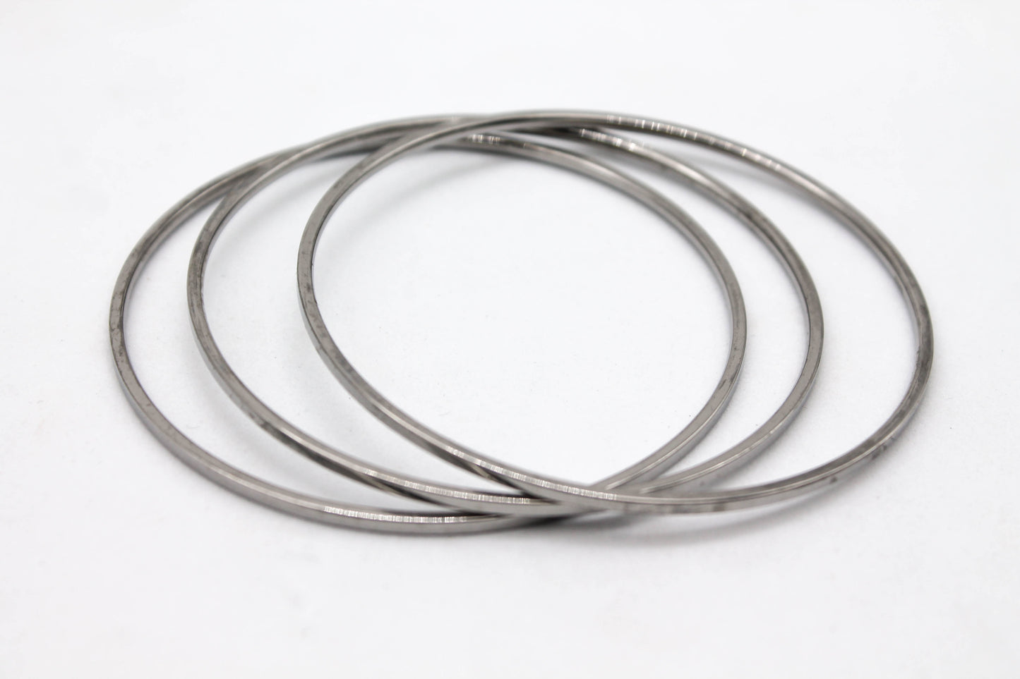 TRIPLE PULSERA / AROS FIN DE SEMANA 7CMS DIAMETRO; TONO PLATEADO