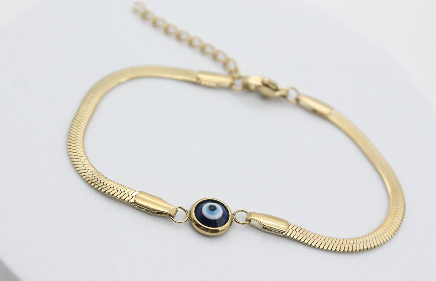 PULSERA PLANCHADA, OJO TURCO  8MM AZUL 16.5CM + EXTENSION 3CM, TONO DORADO