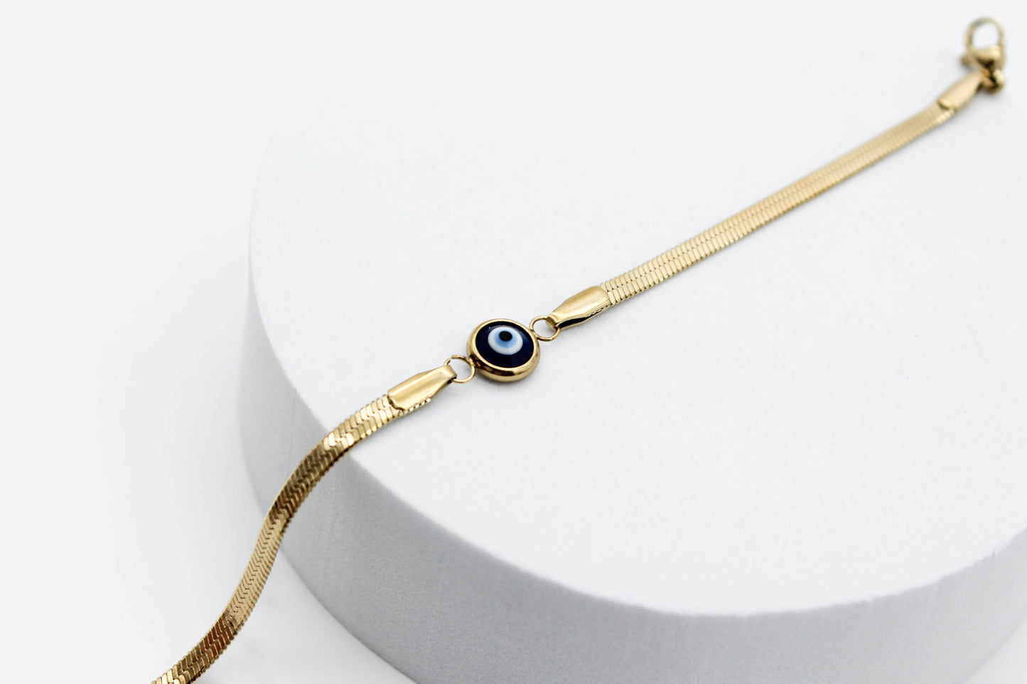 PULSERA PLANCHADA, OJO TURCO  8MM AZUL 16.5CM + EXTENSION 3CM, TONO DORADO