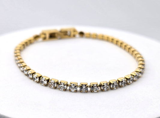 PULSERA TENNIS 3 DORADA