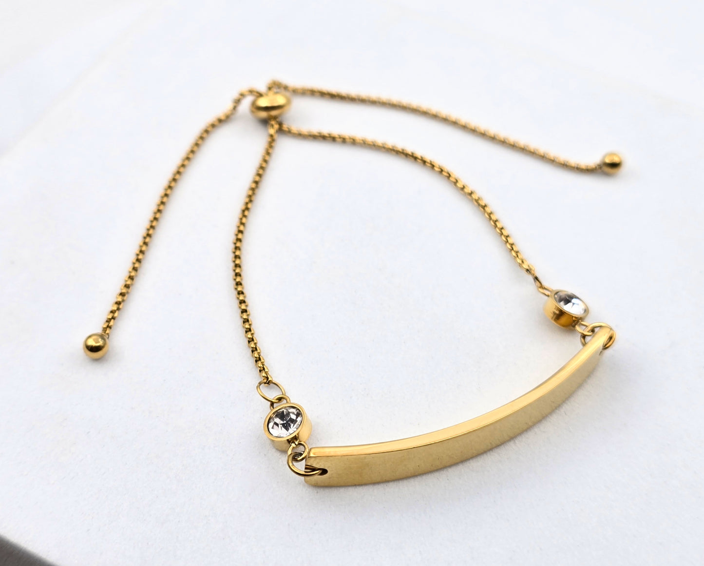 *ESCLAVA AJUSTABLE DOBLE CIRCONIA; TONO DORADO*