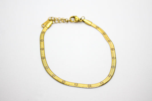 PULSERA CADENA PLANCHADA LOGOS CARTIER; TONO DORADO