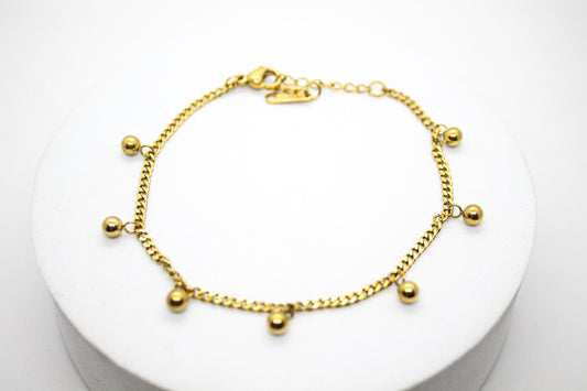 PULSERA CADENA BARBADA ESFERAS; TONO DORADO