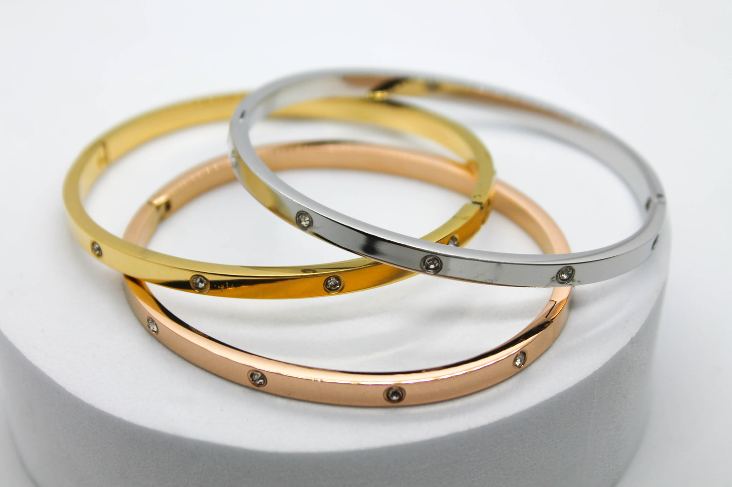 TRIPLE BRAZALETE CIRCONIAS BLANCAS ACERO/DORADO/ROSADO CH-M