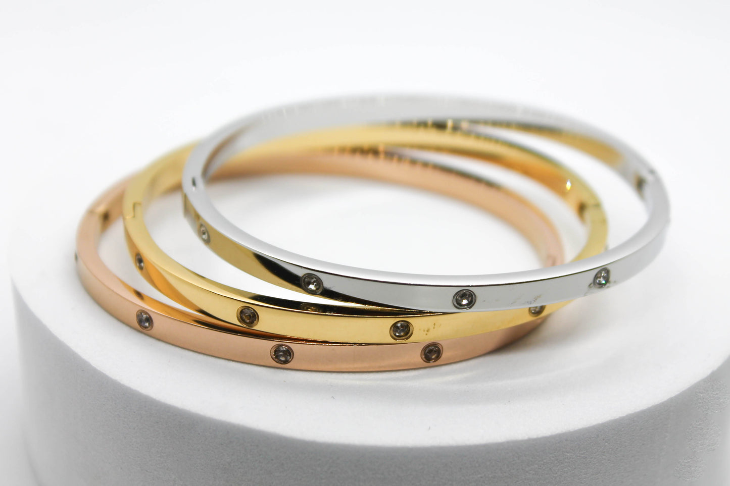 TRIPLE BRAZALETE CIRCONIAS BLANCAS ACERO/DORADO/ROSADO CH-M