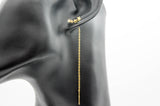 ARETES VIO 4 ESTRELLITAS, TONO DORADO, 7CM DE LARGO