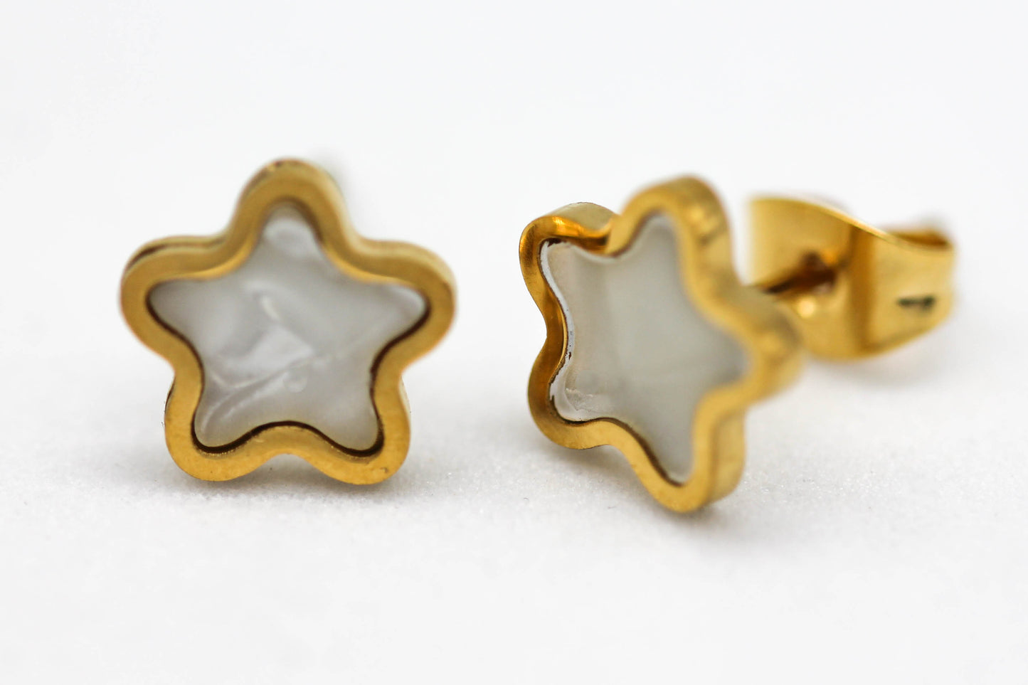 BROQUEL ESTRELLA MADRE PERLA 9MM; TONO DORADO