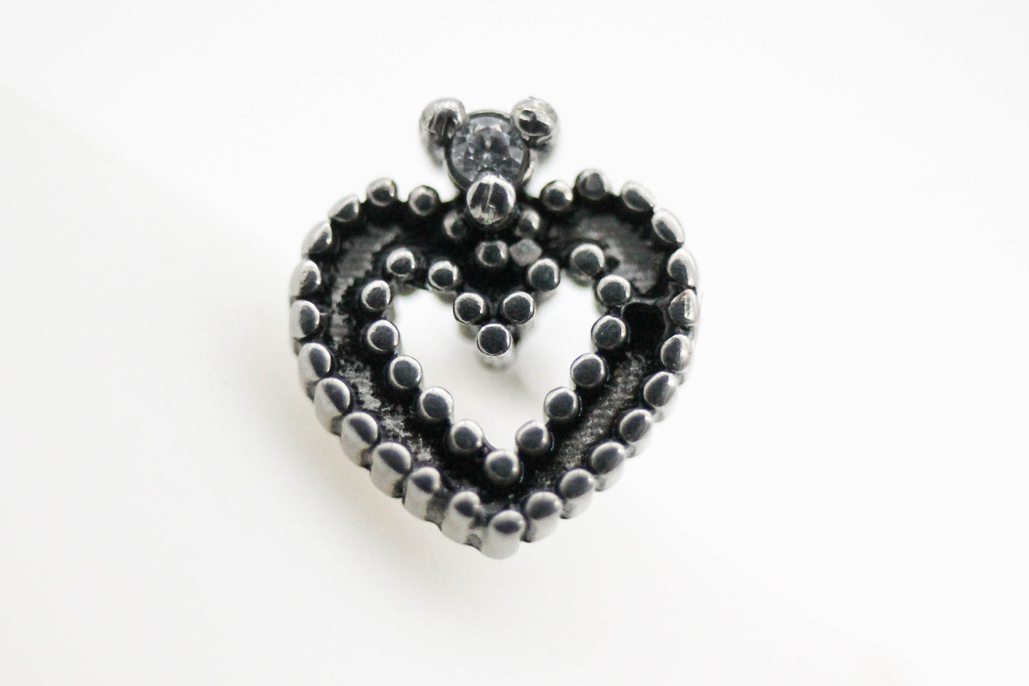 PIERCING CORAZON CORONA CIRCONIA ESMALTE NEGRO TONO PLATEADO