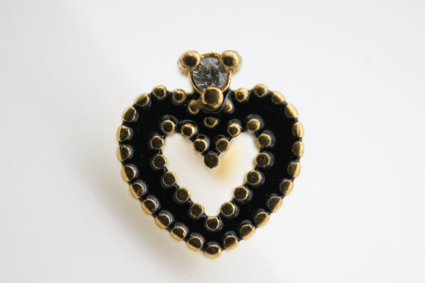 PIERCING CORAZON CORONA CIRCONIA ESMALTE NEGRO TONO DORADO