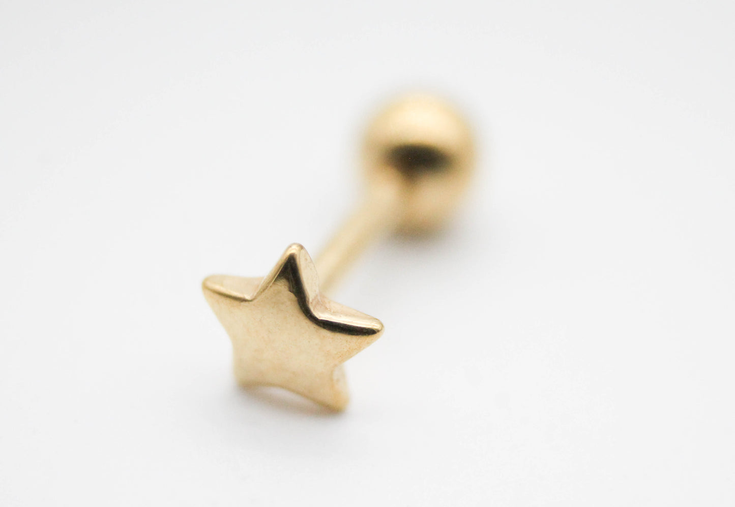 PIERCING ESTRELLA 4MM TONO DORADO