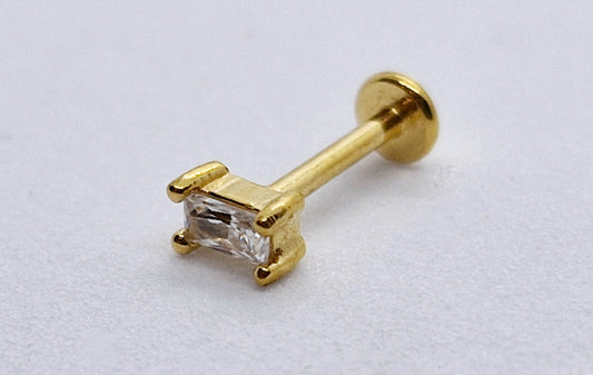 PIERCING CIRCONIA RECTANGULO; TONO DORADO