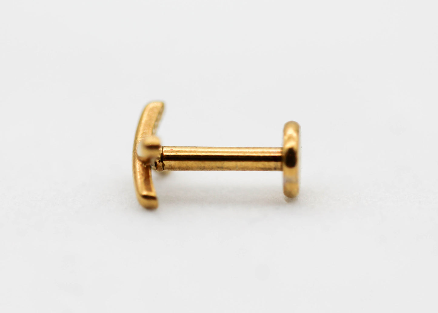 PIERCING "X" LISO 6MM; TONO DORADO