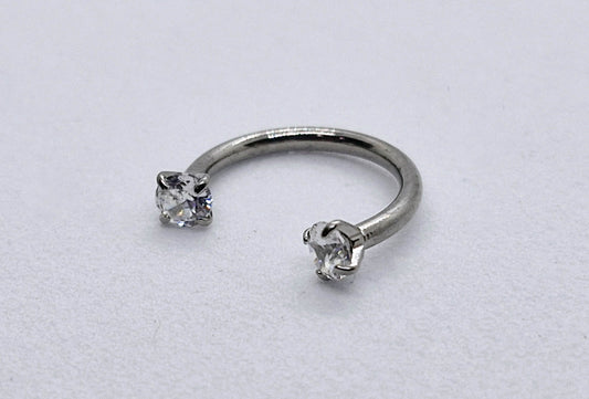 PIERCING CIRCULAR BARBELL #10 CIRCONIAS A LOS EXTREMOS; TONO PLATEADO