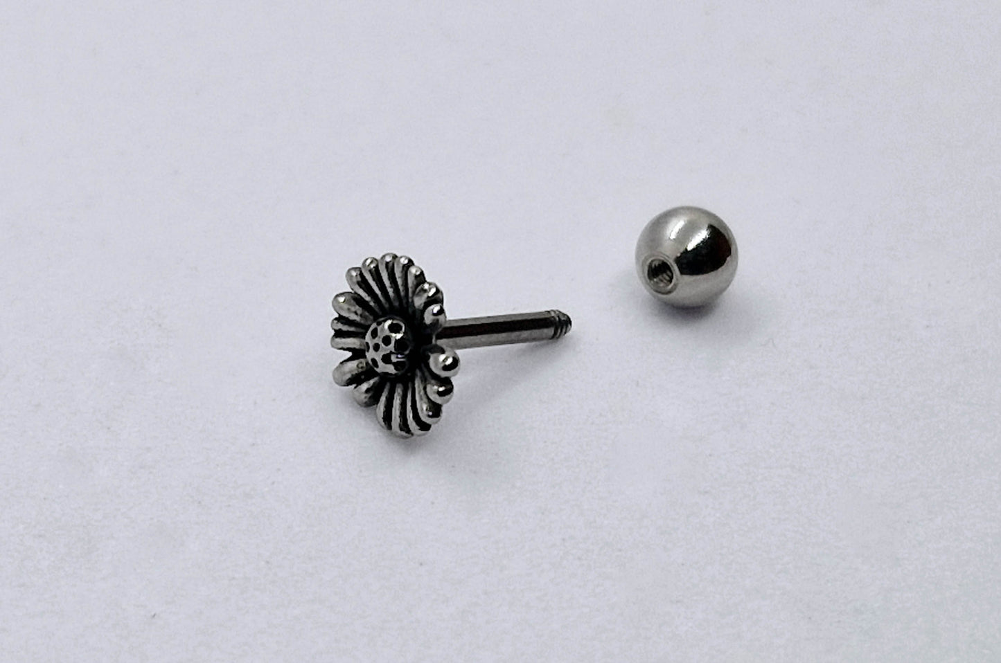PIERCING MARGARITA; TONO PLATEADO