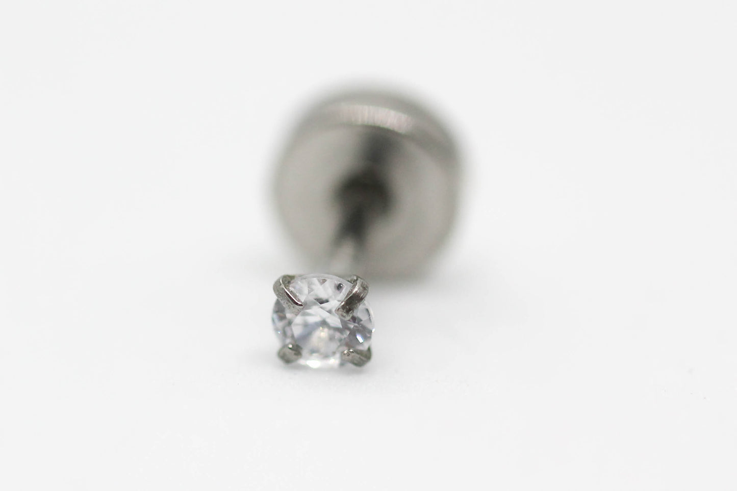 PIERCING CIRCONIA REDONDA 3MM TOPE DE ROSCA GRUESO; TONO PLATEADO