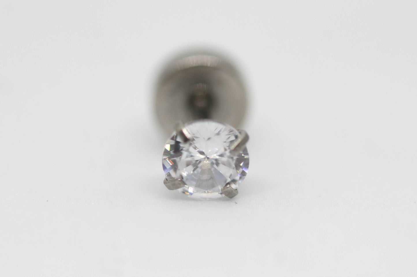 PIERCING CIRCONIA REDONDA 4MM TOPE DE ROSCA GRUESO; TONO PLATEADO