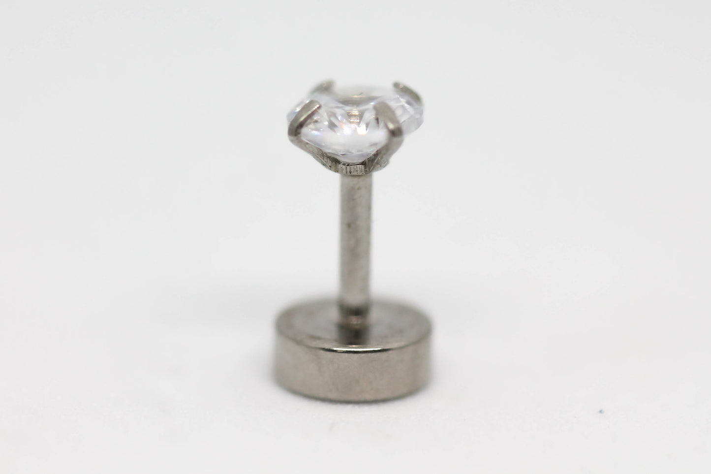 PIERCING CIRCONIA REDONDA 4MM TOPE DE ROSCA GRUESO; TONO PLATEADO