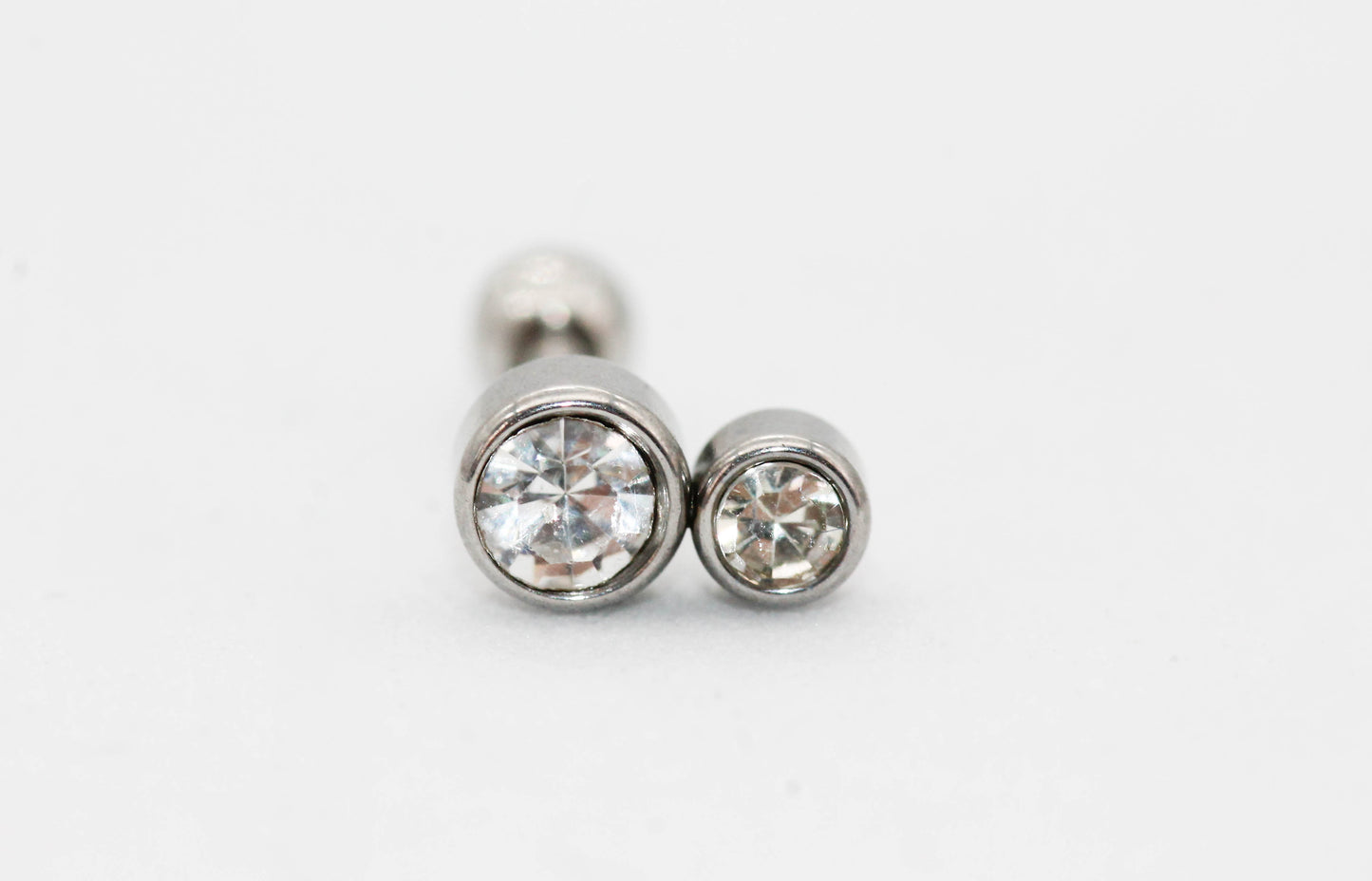 PIERCING DOBLE CIRCULO CH-G CIRCONIA 7MM; TONO PLATEADO