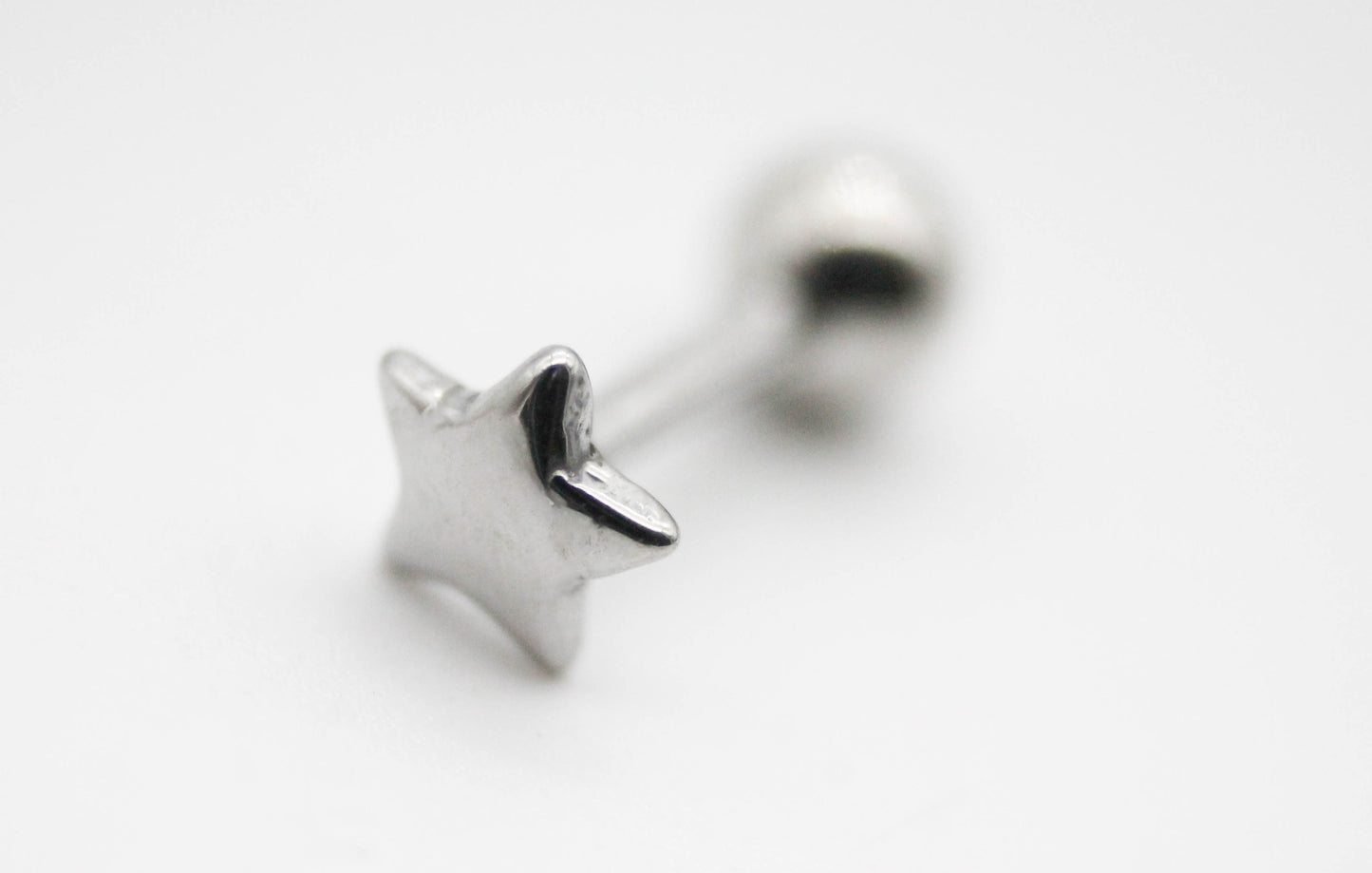 PIERCING ESTRELLA 5MM; TONO PLATEADO