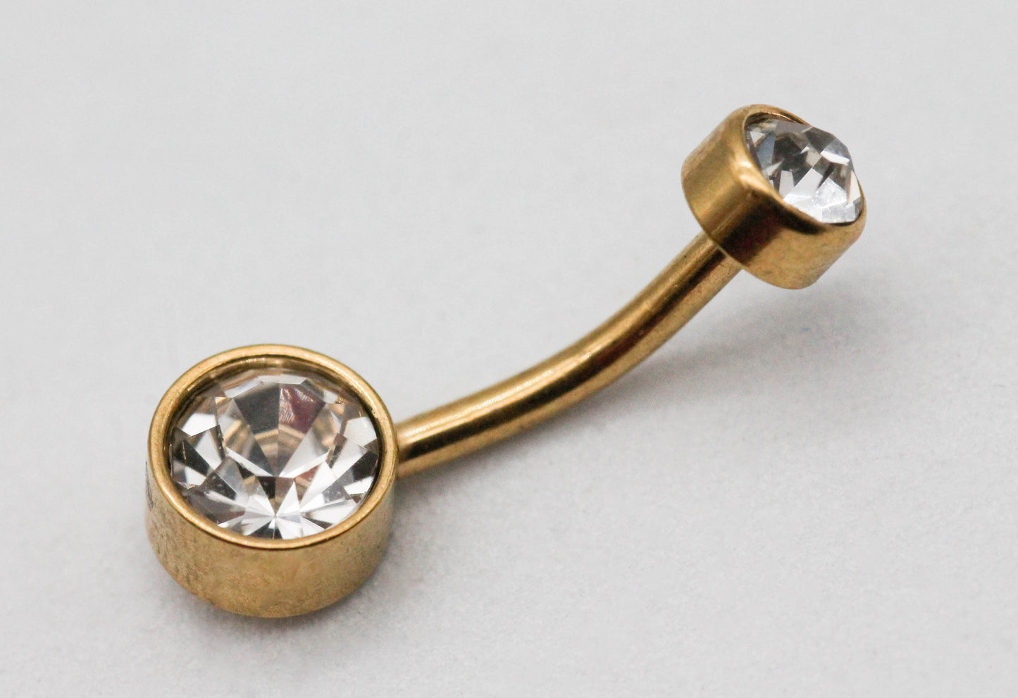 PIERCING OMBLIGO CIRCONIA GRANDE PLANA 7MM CH 5MM; TONO DORADO