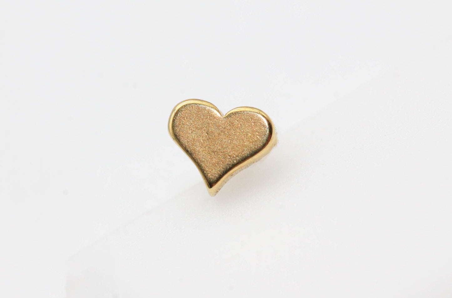 PIERCING CORAZON 5MM; TONO DORADO